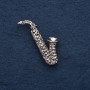 Brooch 'Saxophone' 5x2 cm, gray metal